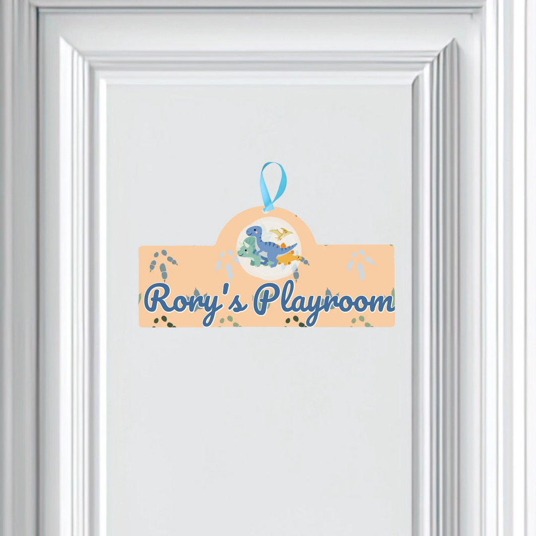 Decorative sign with dinosaur illustration and 'Rory's Playroom' text on a white background