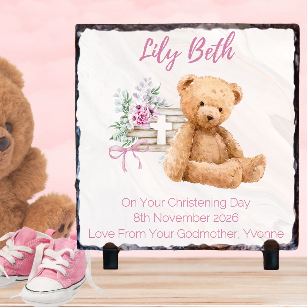 Personalized christening gift with teddy bear, pink shoes, and floral design on a pink background