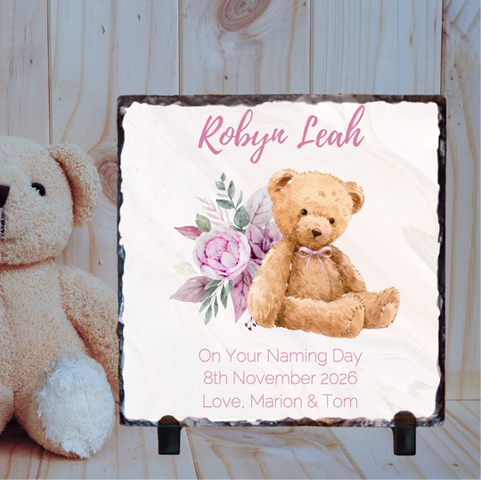 Personalized plaque with teddy bear and flowers for a naming day, featuring the name 'Robyn Leah'.