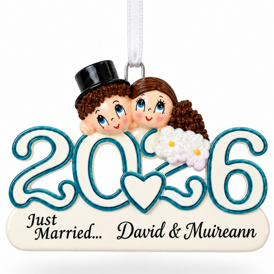 A personalized wooden hanging ornament featuring the year 2016 in large teal-outlined numerals, with a cartoon bride and groom couple above and the text 'Just Married.
