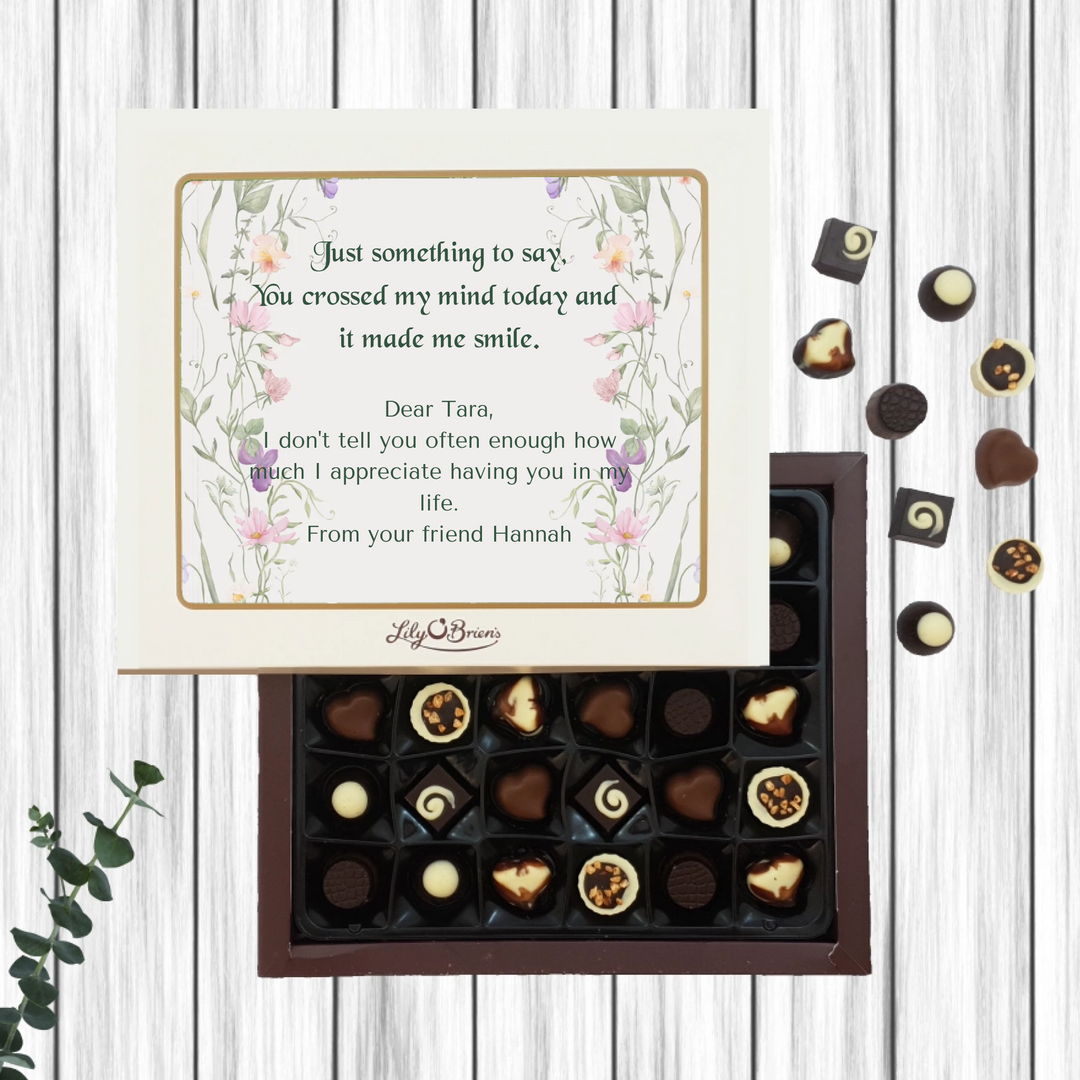 Box of Lily O’Brien’s Chocolates with floral design on the sides and personal message