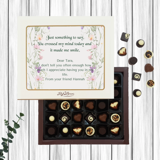 Box of Lily O’Brien’s Chocolates with floral design on the sides and personal message