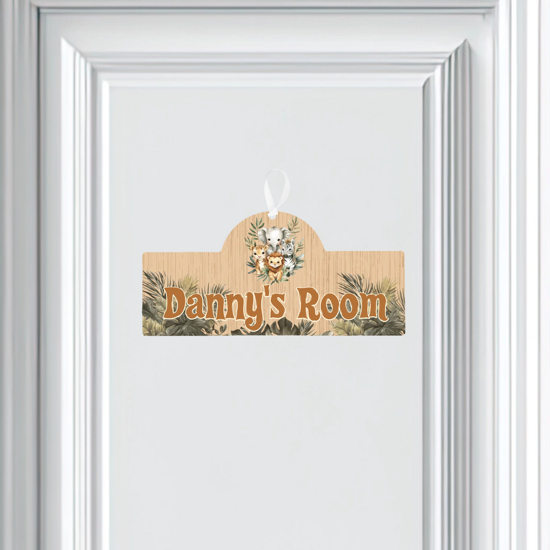 Wooden door hanger with 'Danny's Room' text on a white door