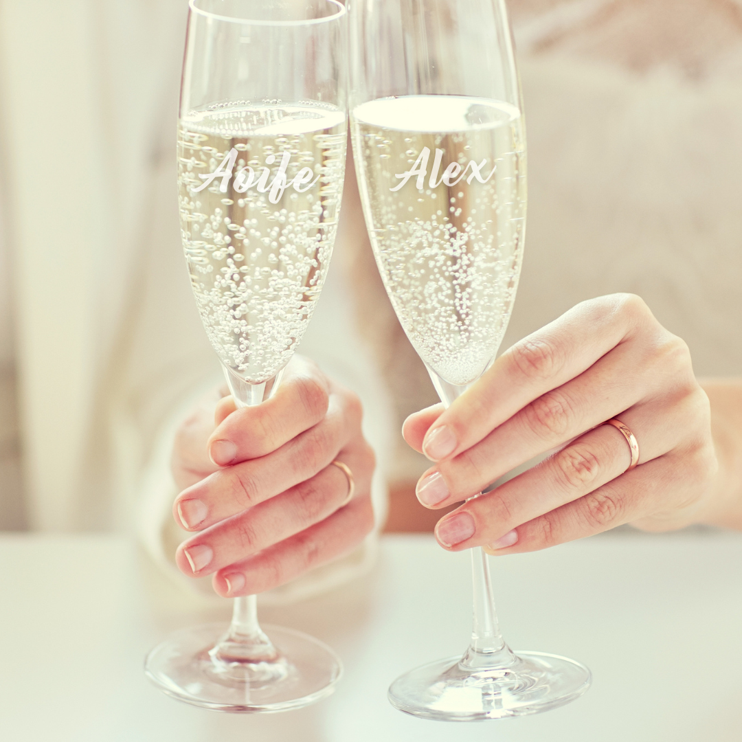 Set of two champagne glasses for a couple, that is personalised with their names