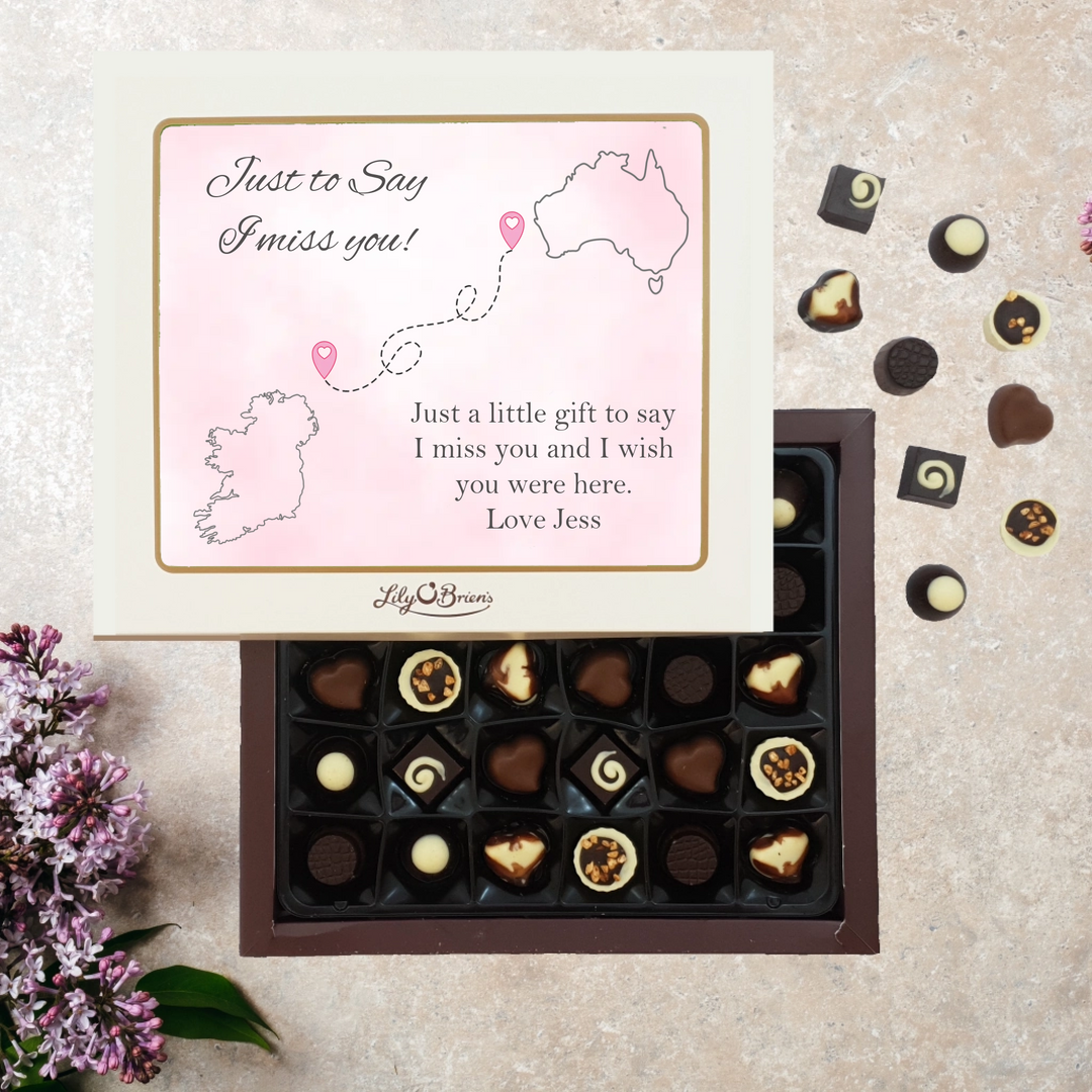 a lily O'brien chocolate box that is personalised with two different country maps and a personal message