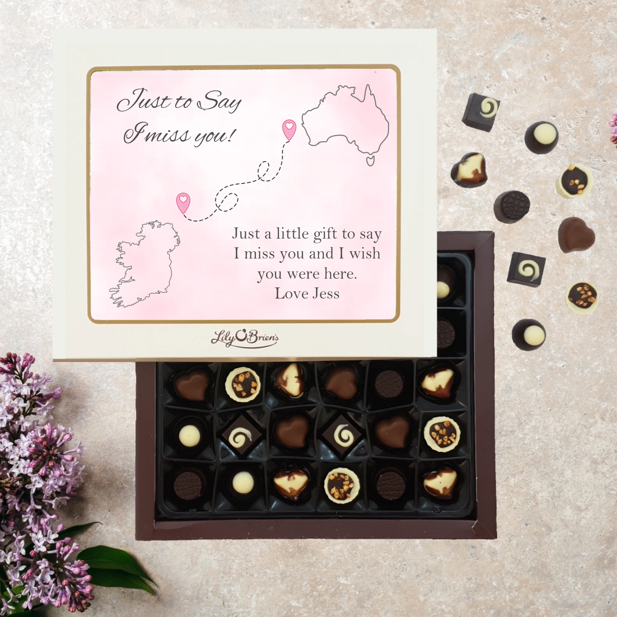 a lily O'brien chocolate box that is personalised with two different country maps and a personal message