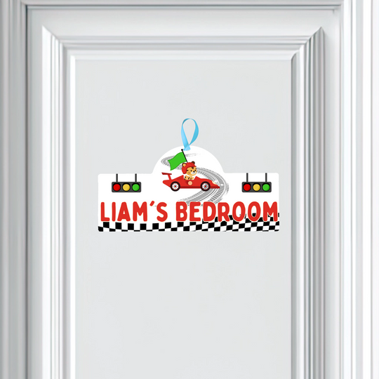 Children's door sign with race car design and 'Liam's Bedroom' text on a white background.