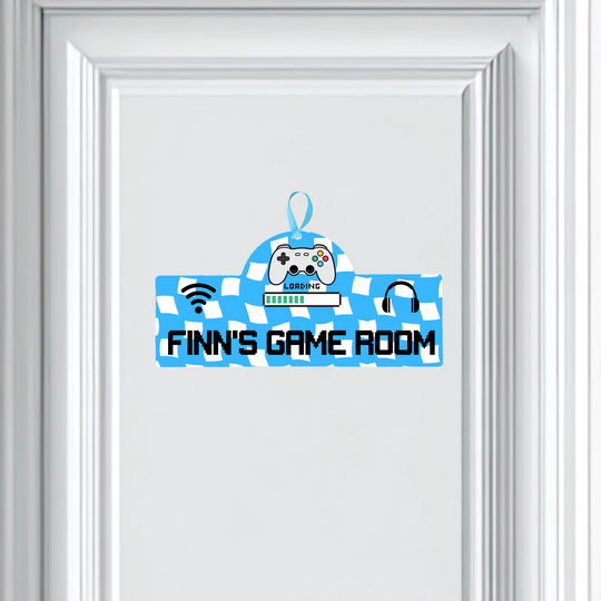 Decorative sign for 'Finn's Game Room' with gaming-themed design on a white background