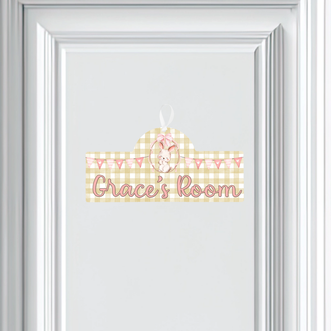 Decorative door sign with 'Grace's Room' text on a white background