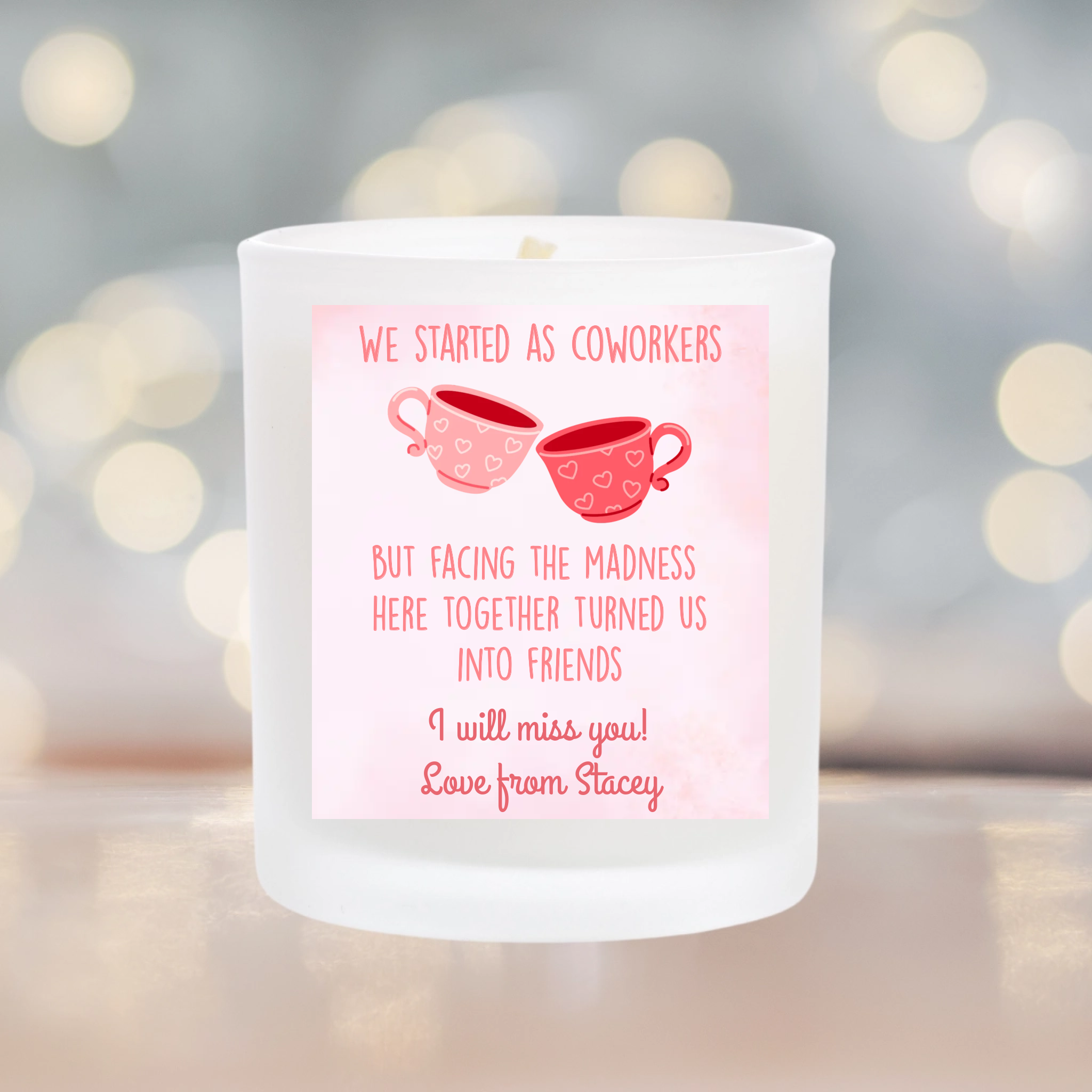 scented candle with sticker that is personalised. sticker is pink watercolour and has two tea cups or coffee cups. add your own message