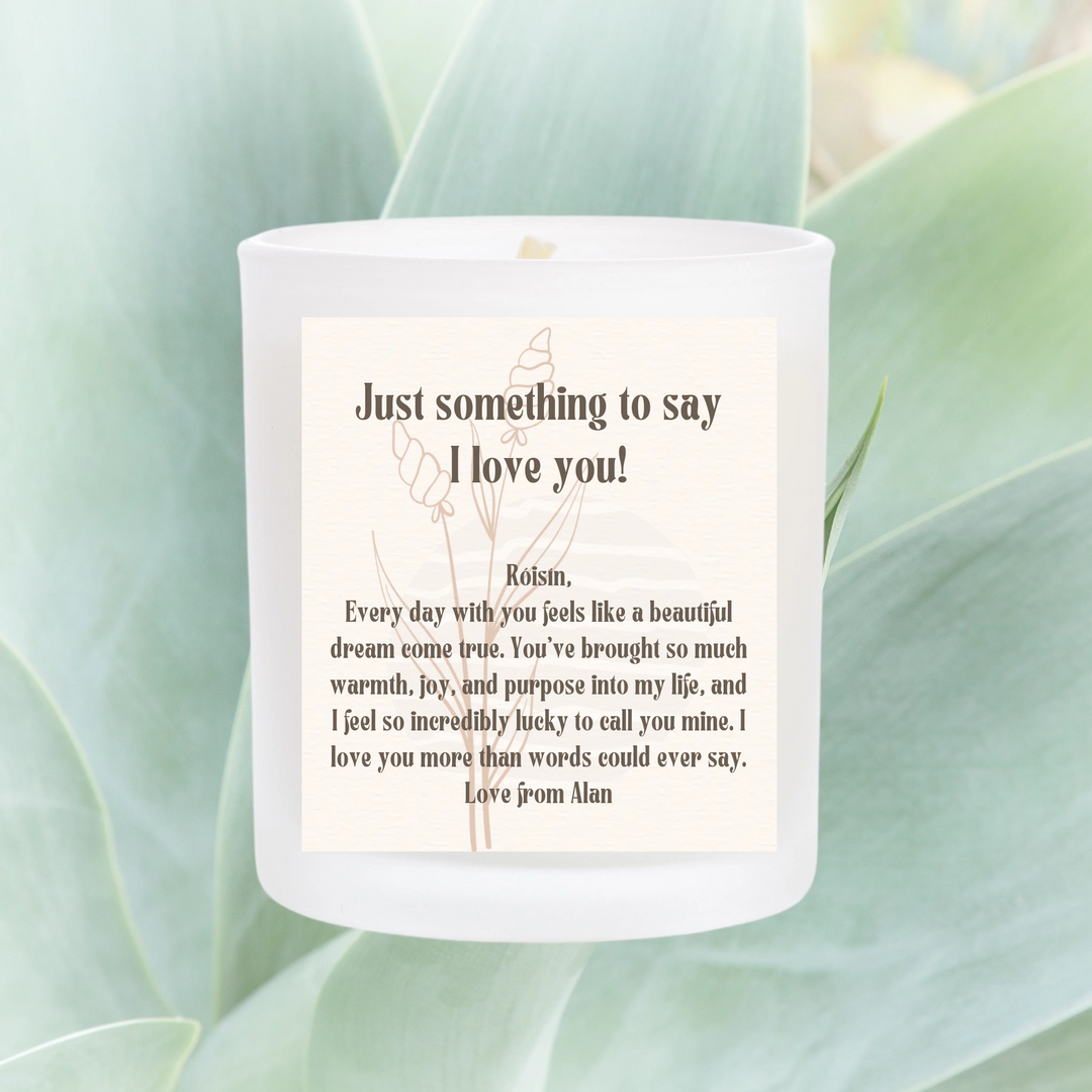 scented candle with personalised sticker.  light simple flower design with a personal message