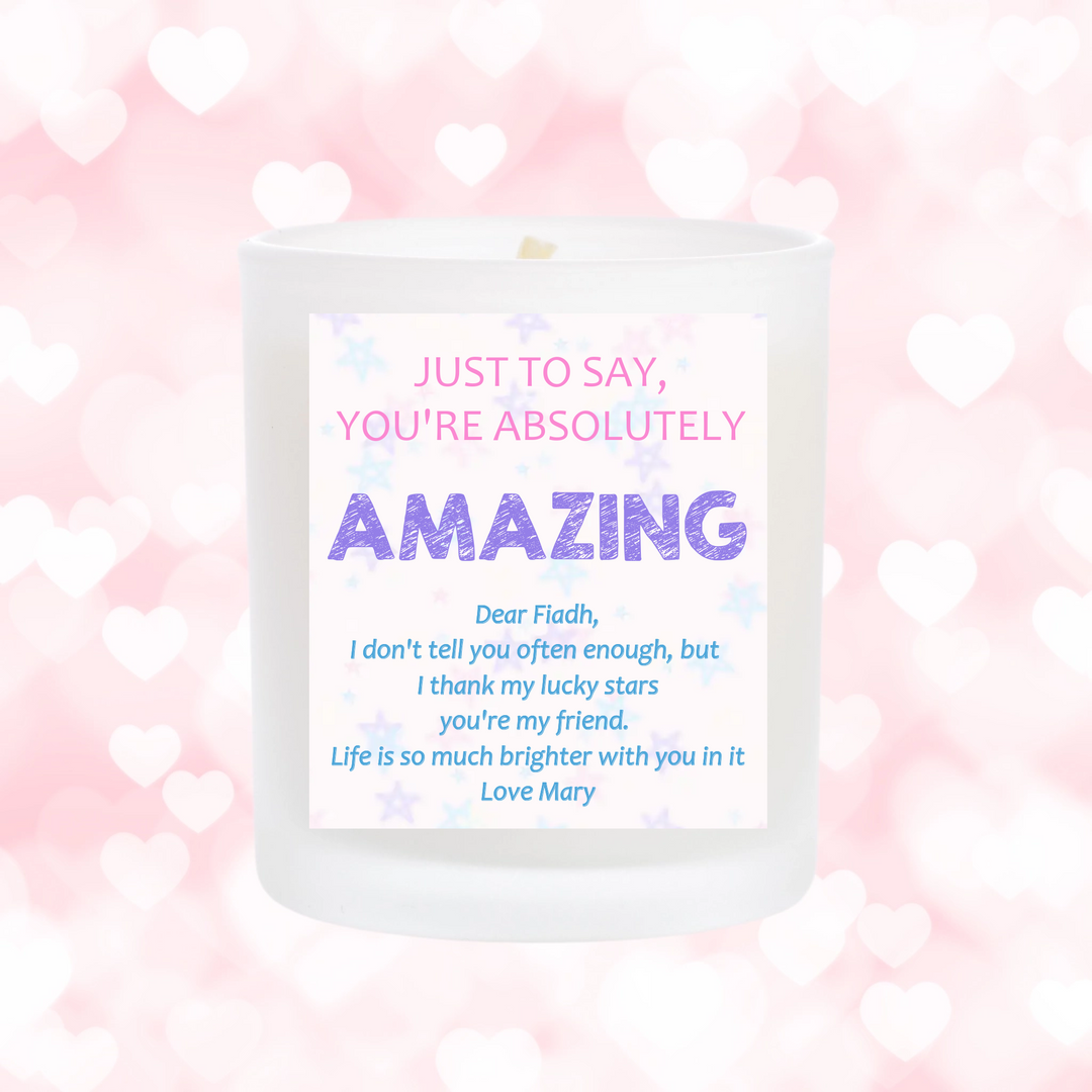 Scented candle with personalised sticker. the sticker is light pink with star designs. add your own message