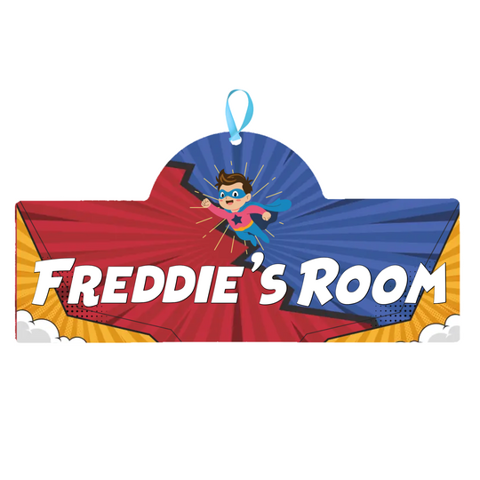Superhero-themed room sign with cape and 'Freddie's Room' text on a white background
