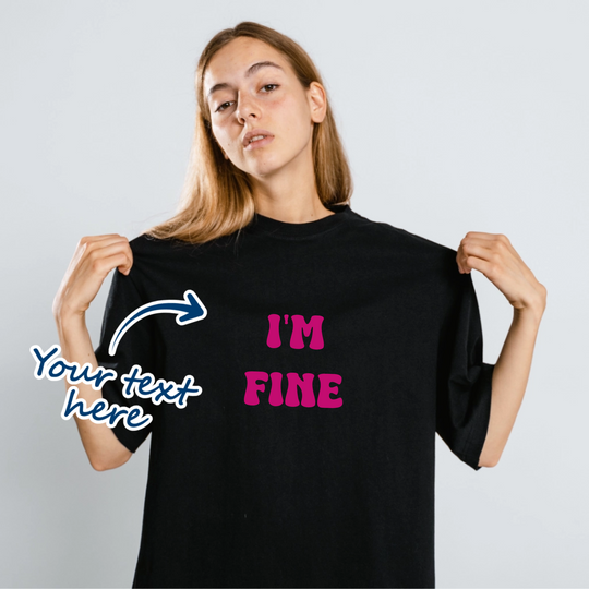 Woman wearing black t-shirt that is personalised with her own text with different fonts and font colours