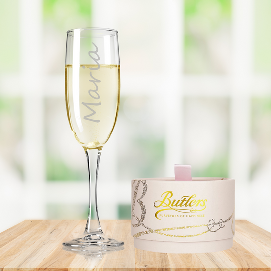 Champagne flute with name and box of butlers champagne pink chocolate