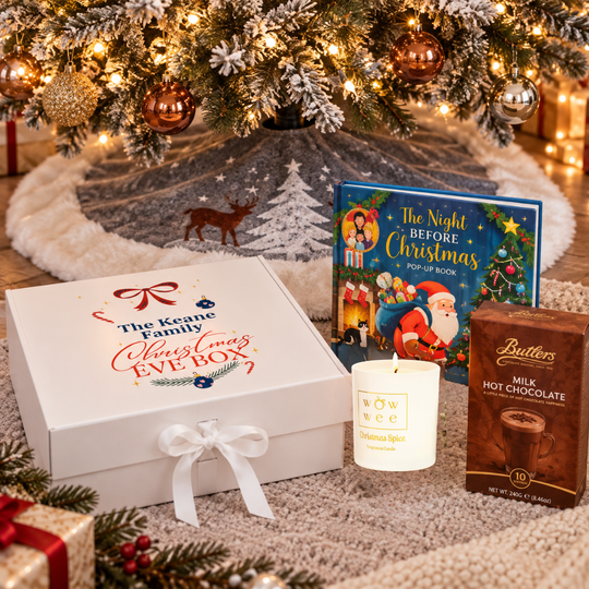 Personalised Family Christmas Eve Box filled with Festive Candle, Christmas Tree Skirt, Butler's Hot Chocolate & Pop-up Story Book